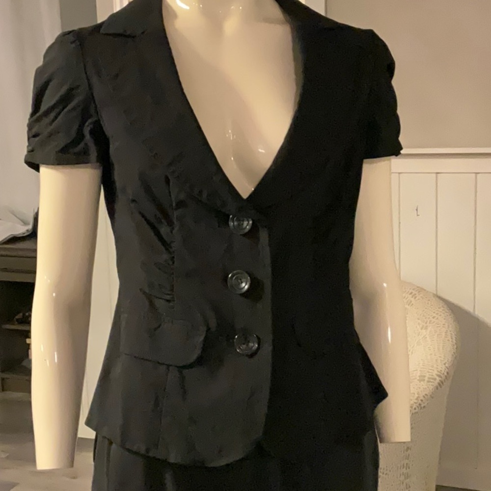 Ricki’s black blazer